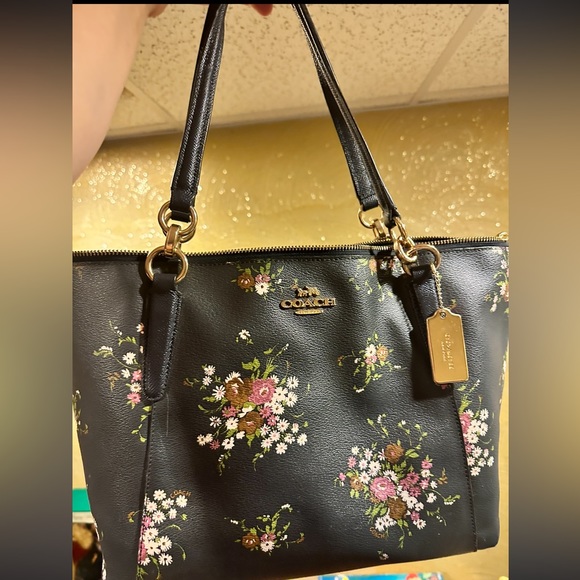 Coach Handbags - Coach limited edition floral purse bundle 3 items purse, clutch, and makeup bag